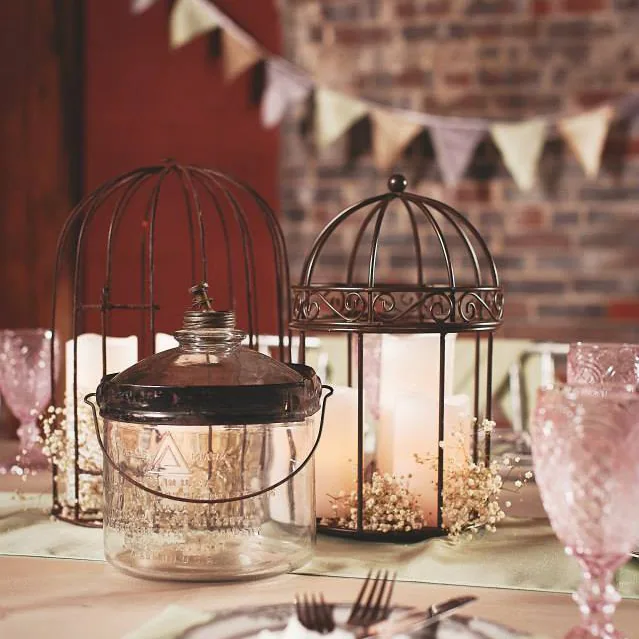 Rustic lantern centerpiece at a Depot Square Events reception